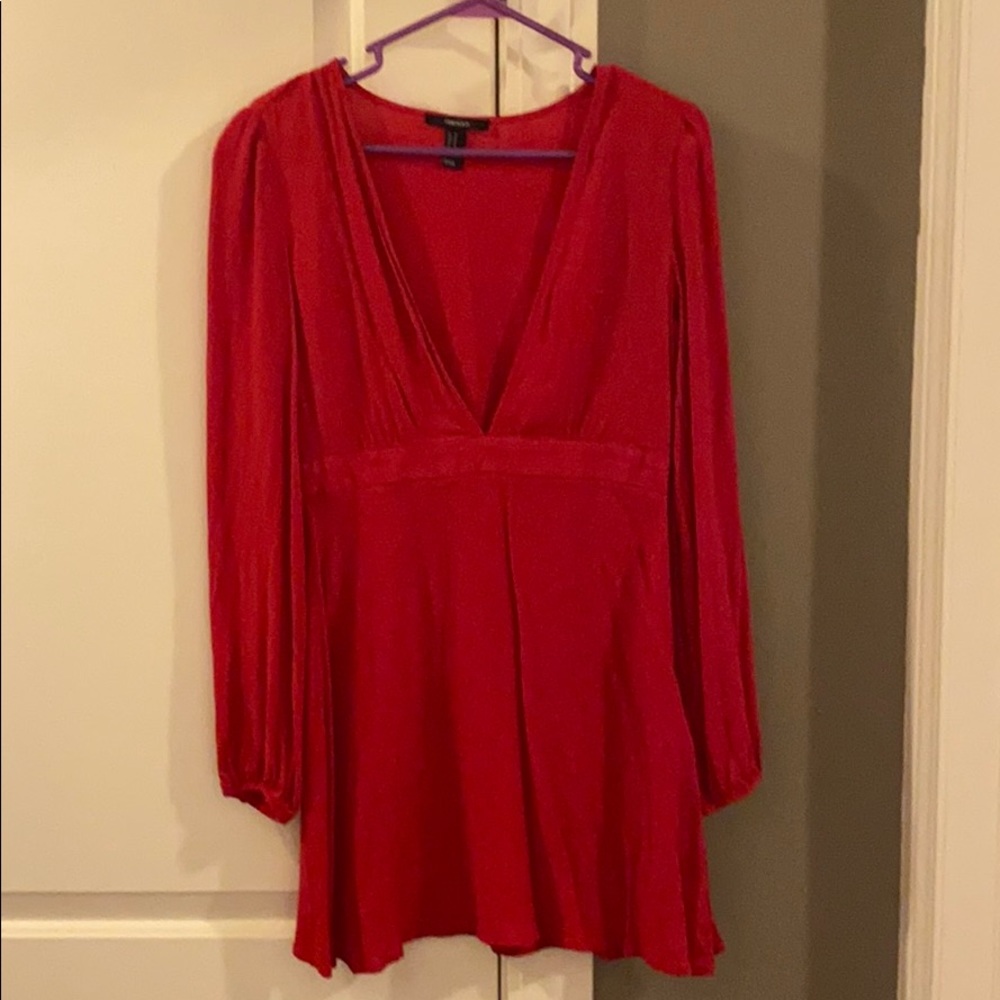 Low cut, short length red dress